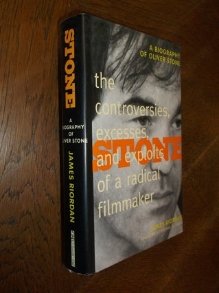 Item #14944 Stone: The Controversies, Excesses, and Exploits of a Radical Filmmaker. James Riordan