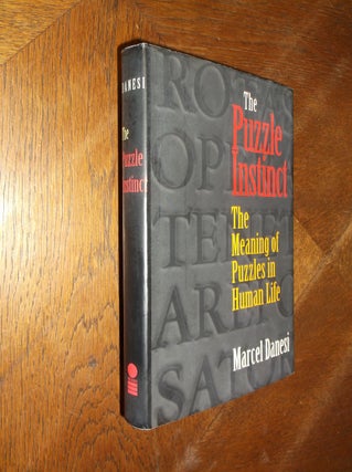 Item #25927 The Puzzle Instinct: The Meaning of Puzzles in Human Life. Marcel Danesi