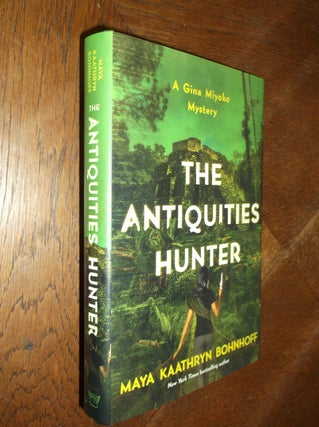 Item #26175 The Antiquities Hunter: A Gina Miyoko Mystery. Maya Kaathryn Bohnhoff