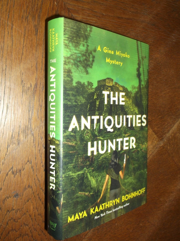 Item #26175 The Antiquities Hunter: A Gina Miyoko Mystery. Maya Kaathryn Bohnhoff.