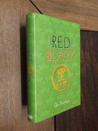 Item #29712 When Red is Black. Qiu Xiaolong
