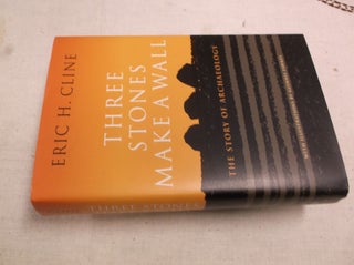 Item #30803 Three Stones Make A Wall: The Story of Archaeology. Eric H. Cline